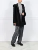 The Davie Hooded Curly Shearling Coat sold by Pologeorgis