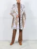 The Spotted Fur Coat sold by Pologeorgis