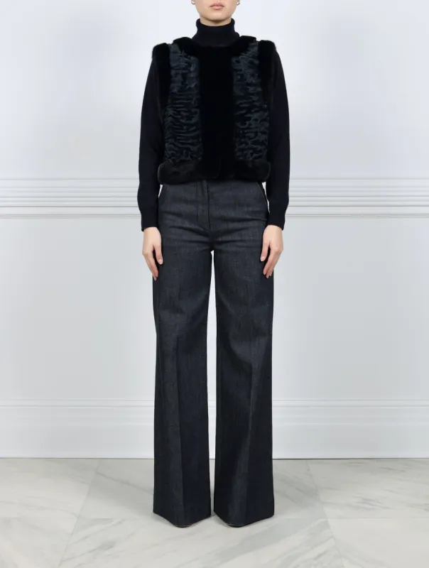 The Emma Navy Lamb & Mink Cropped Vest sold by Pologeorgis