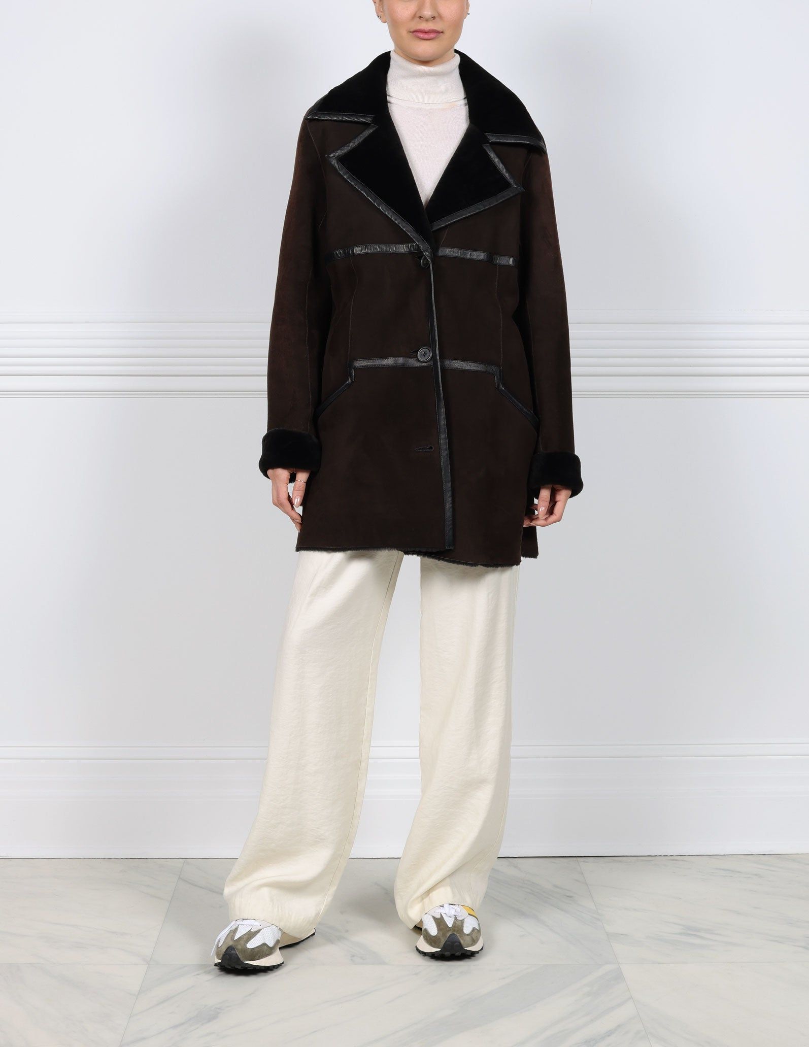 Shearling Coat with Leather Seams sold by Pologeorgis