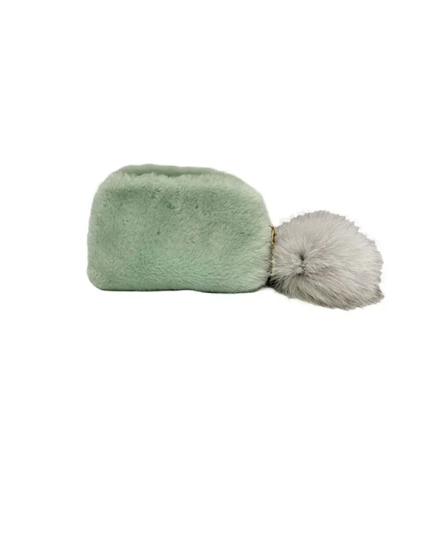 Shearling Pouch Bag with Pom Pom sold by Pologeorgis