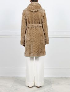 The Emily Cable Knit Grooved Shearling Coat sold by Pologeorgis