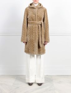 The Emily Cable Knit Grooved Shearling Coat sold by Pologeorgis