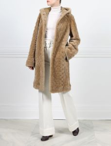 The Emily Cable Knit Grooved Shearling Coat sold by Pologeorgis