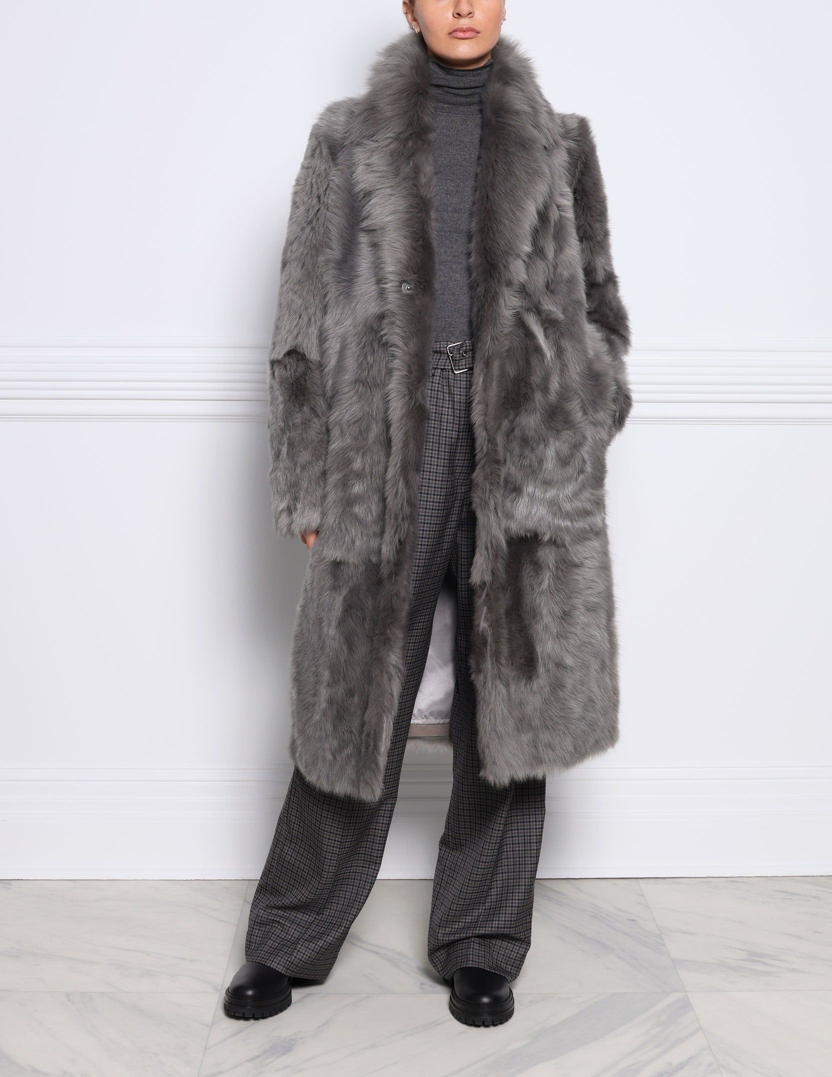 The Giovanna Toscana Shearling Coat sold by Pologeorgis
