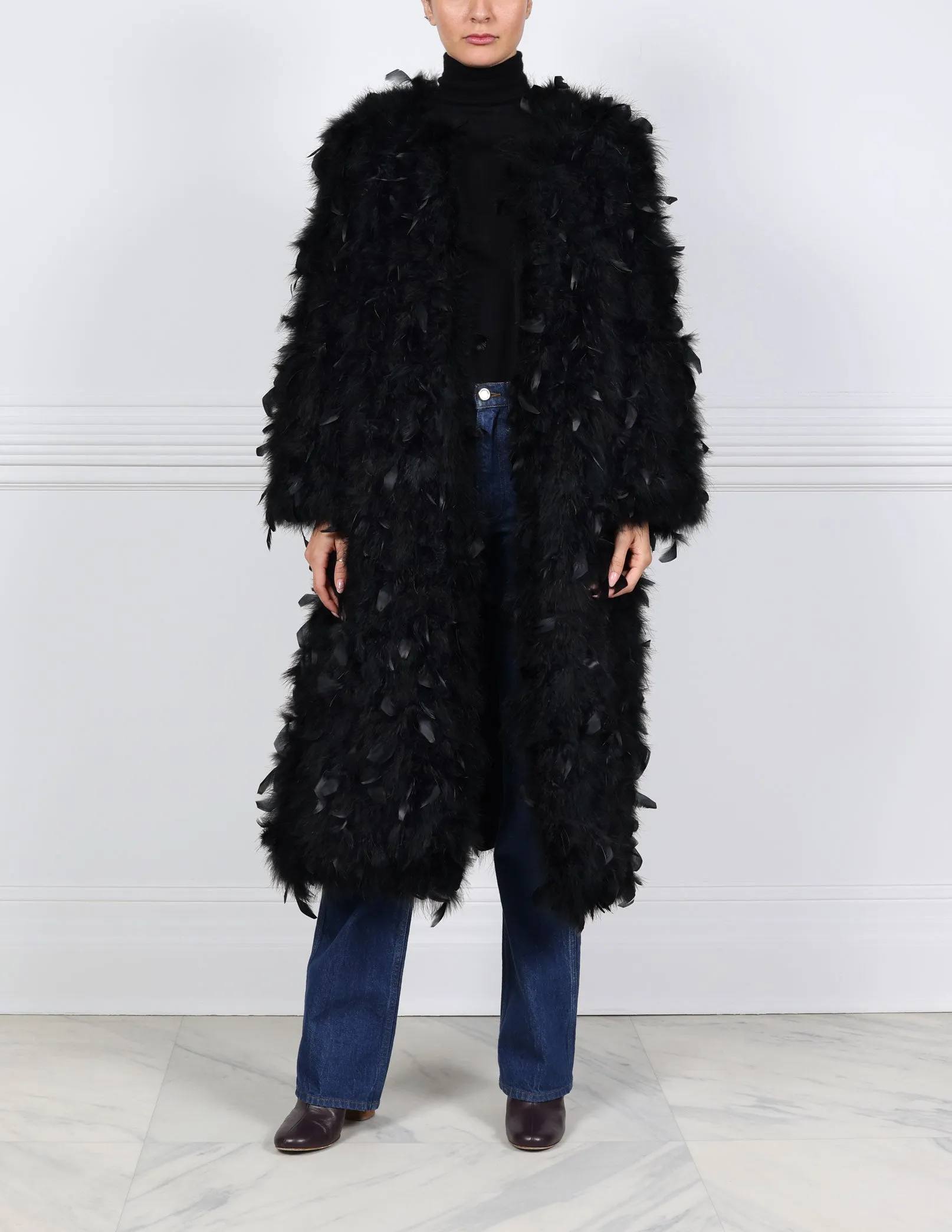 The Zaza Feather Coat sold by Pologeorgis