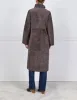The Cleo Reversible Curly Shearling Coat sold by Pologeorgis