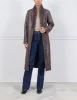 The Cleo Reversible Curly Shearling Coat sold by Pologeorgis