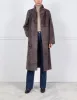 The Cleo Reversible Curly Shearling Coat sold by Pologeorgis