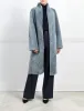 The Cleo Reversible Curly Shearling Coat sold by Pologeorgis