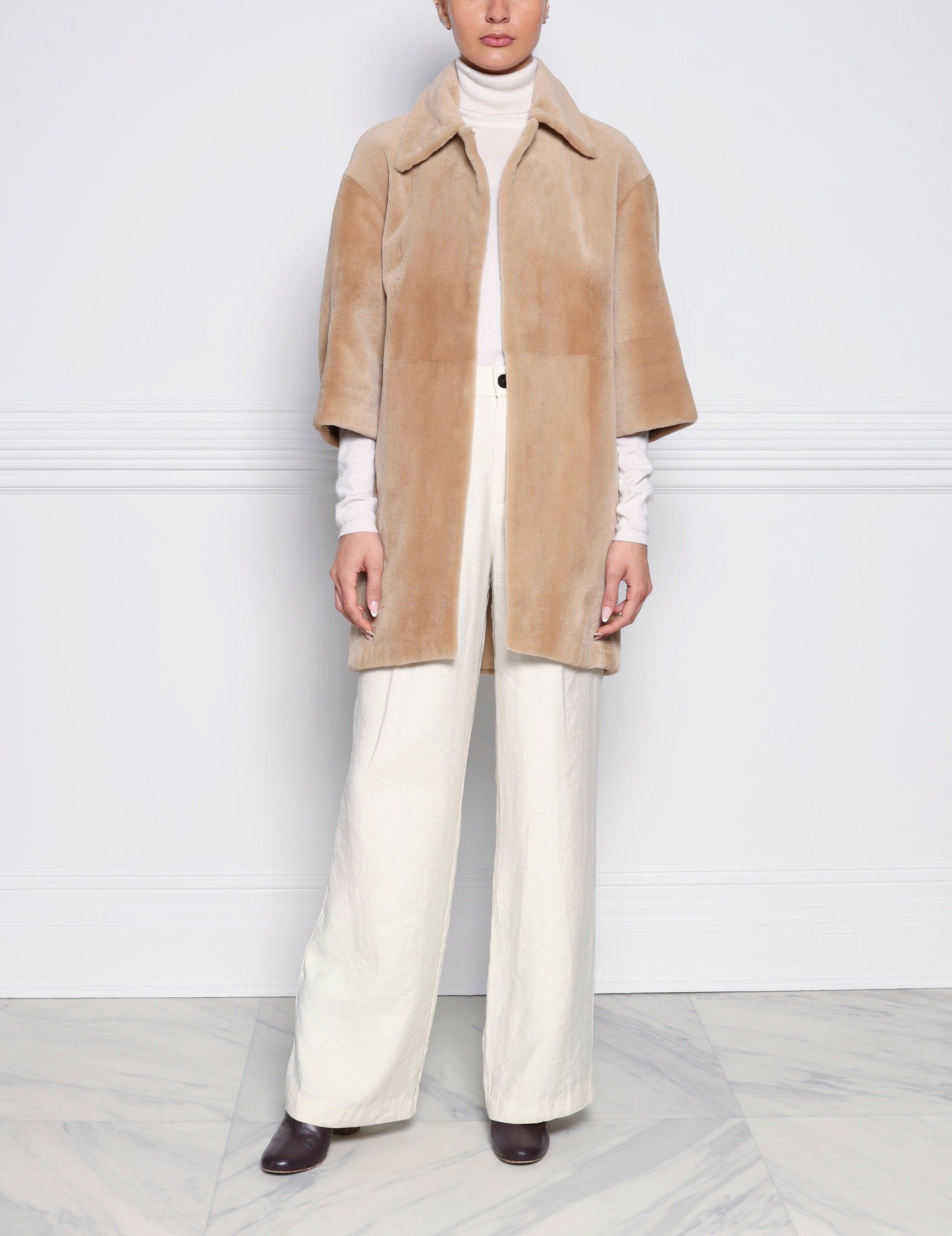 The Inaya Sheared Mink Fur Coat sold by Pologeorgis