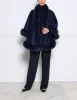 The Sol Cashmere Cape with Fox Trim sold by Pologeorgis