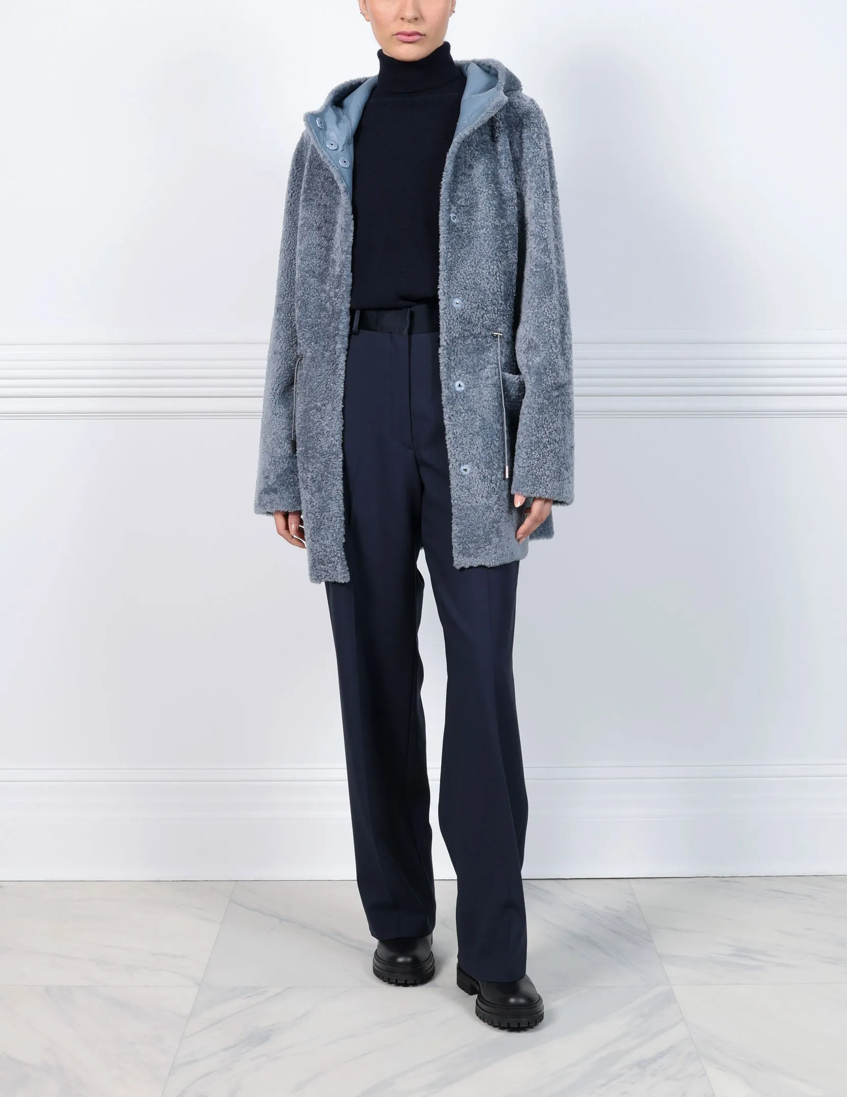 The Talia Shearling Coat sold by Pologeorgis