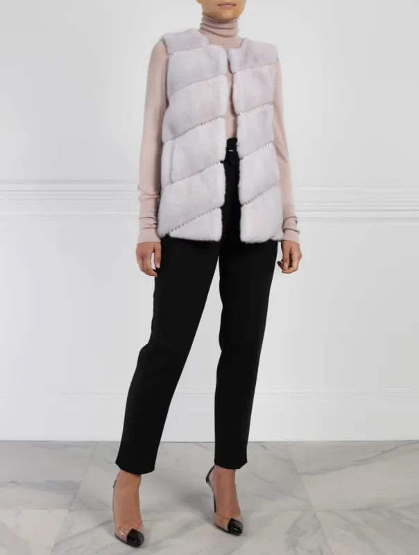 The Aarya Azurine Mink Fur & Python Vest sold by Pologeorgis