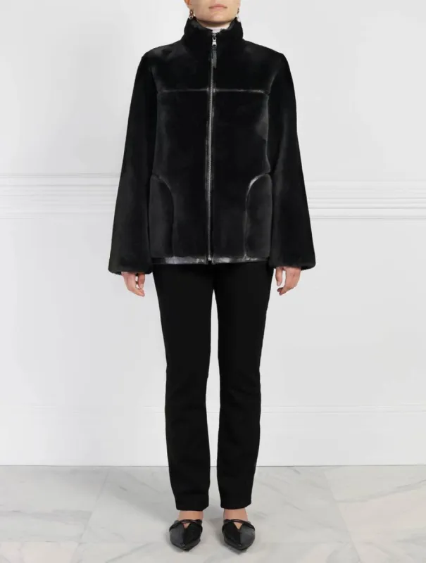 The Kacey Merino Shearling Zip Jacket sold by Pologeorgis