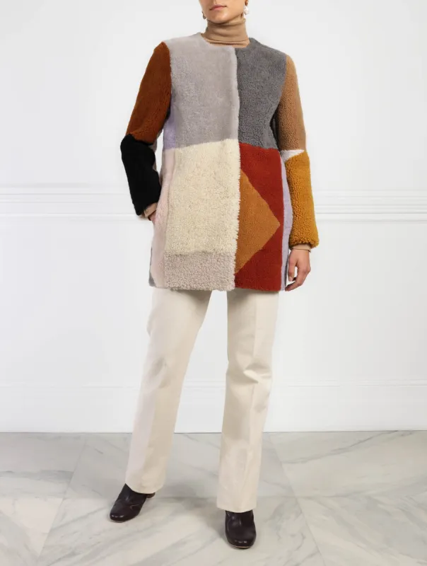 The Eartha Sustainable Shearling Coat sold by Pologeorgis