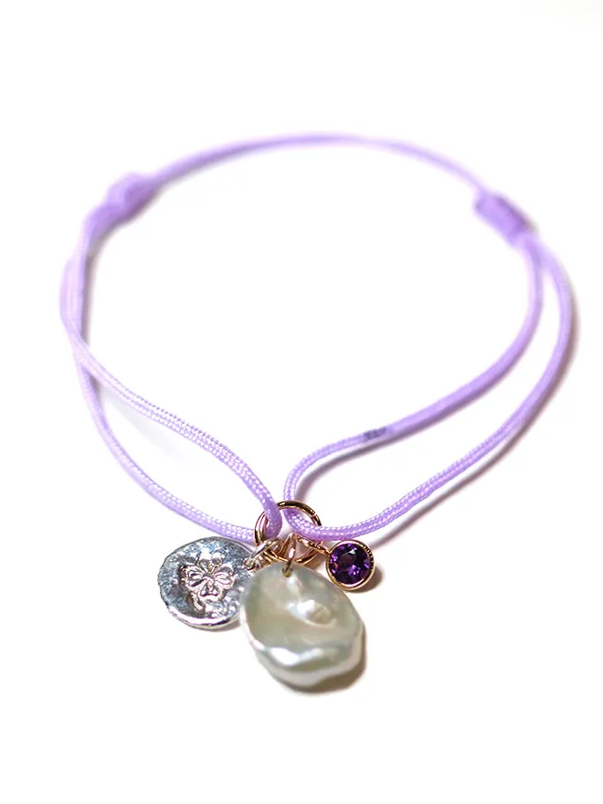 Cord Charm Bracelet Purple sold by POPPY FINCH