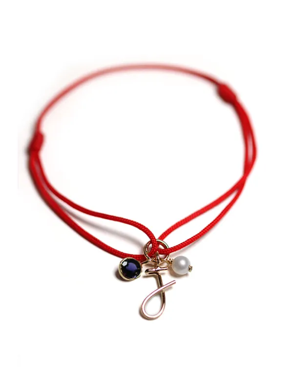 Cord Charm Bracelet Red sold by POPPY FINCH