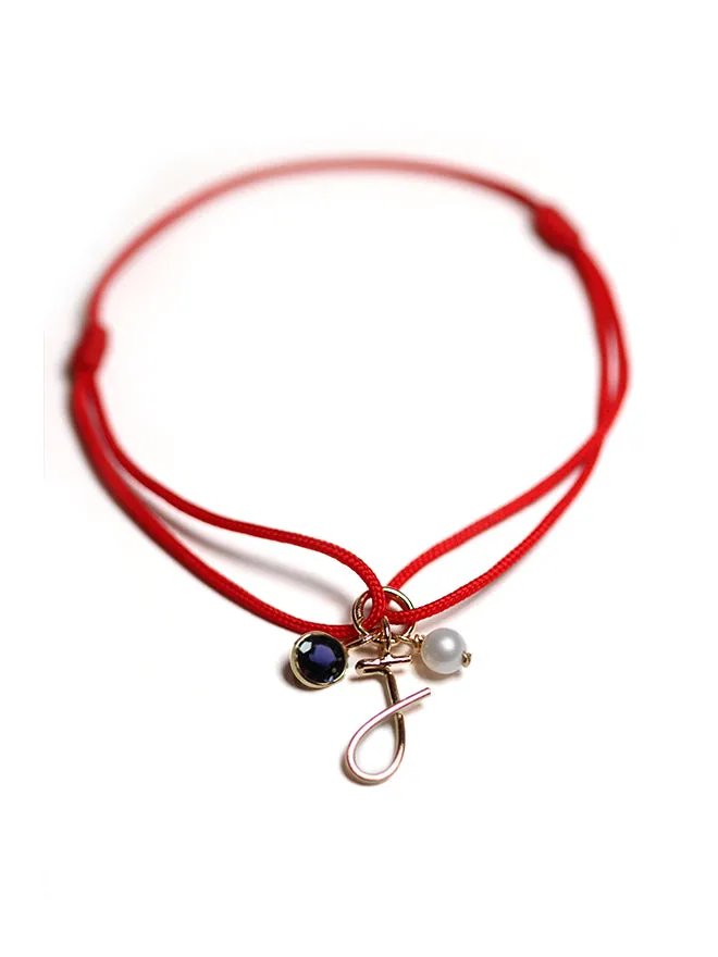 Cord Charm Bracelet Red sold by POPPY FINCH