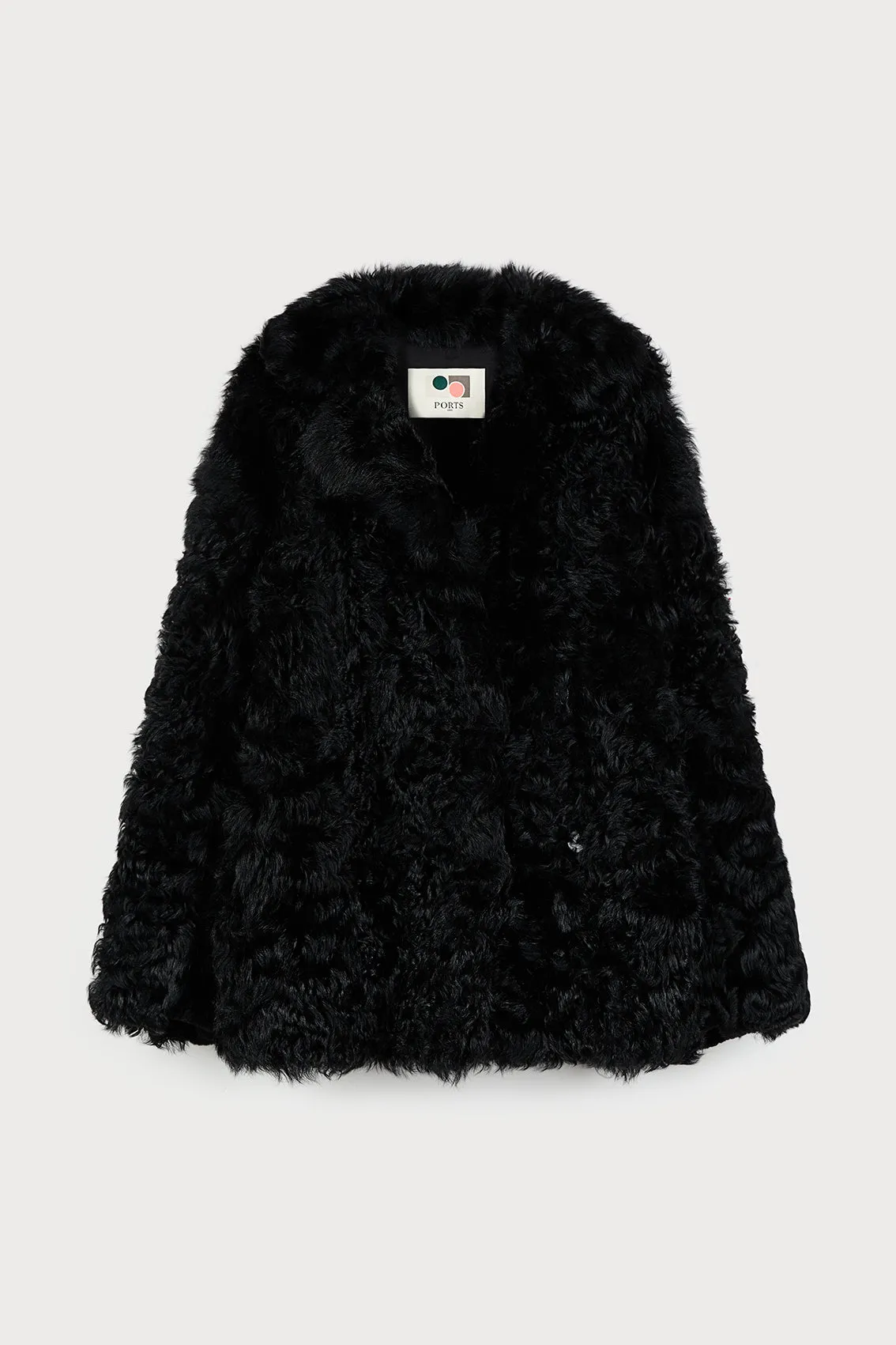 BLACK WOOLFELL COAT sold by Ports 1961