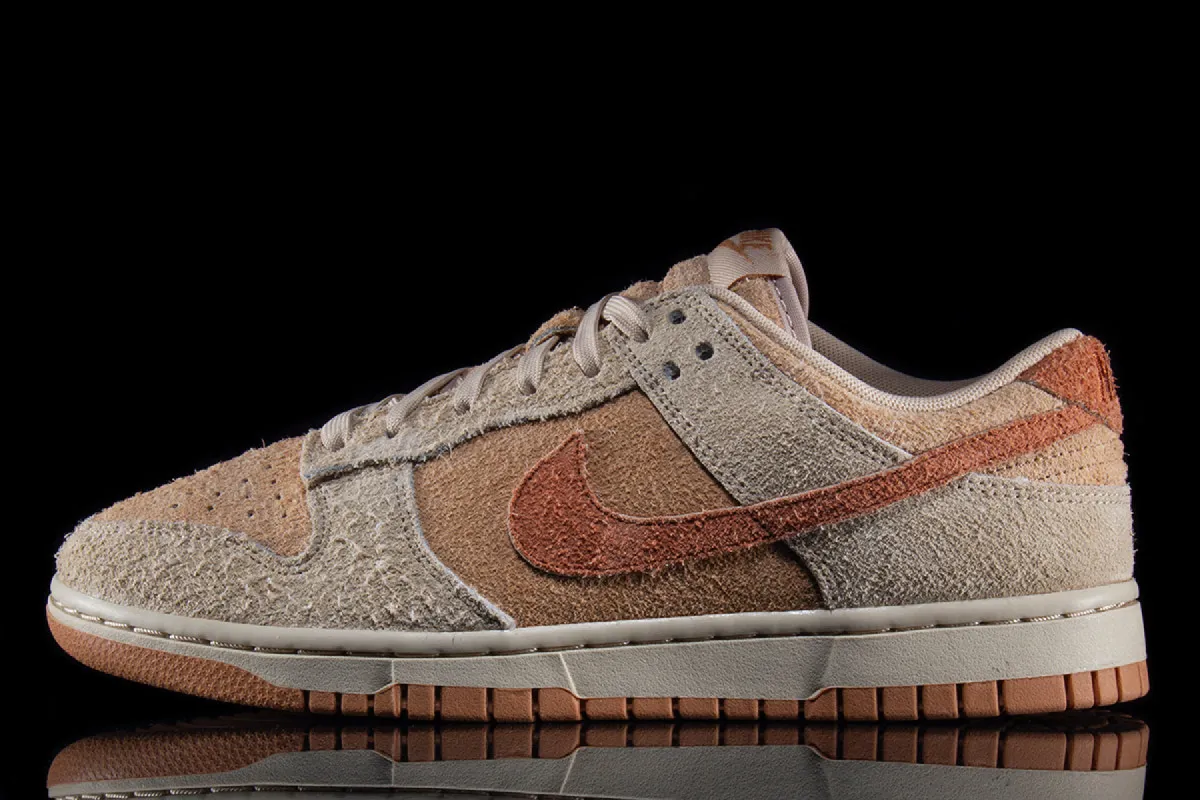 Women's Dunk Low sold by Premier