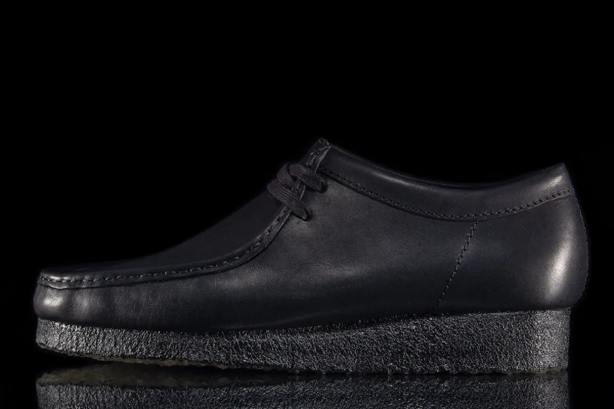 Wallabee Black Leather sold by Premier