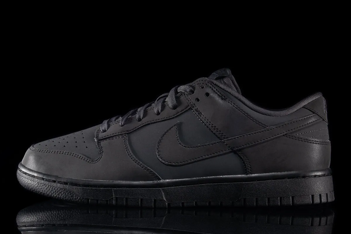 Women's Dunk Low (Cyber) sold by Premier