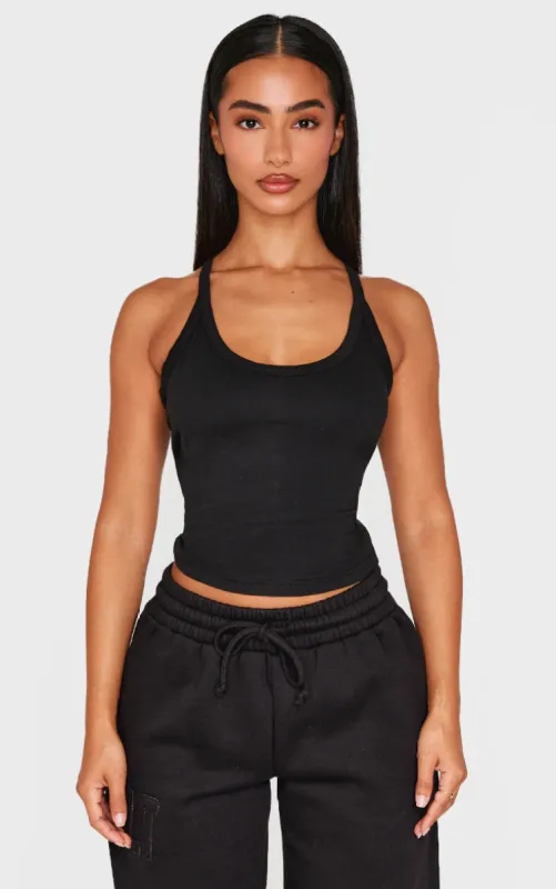 Petite Black Embroidered Longline Tank Top sold by Pretty Little Thing