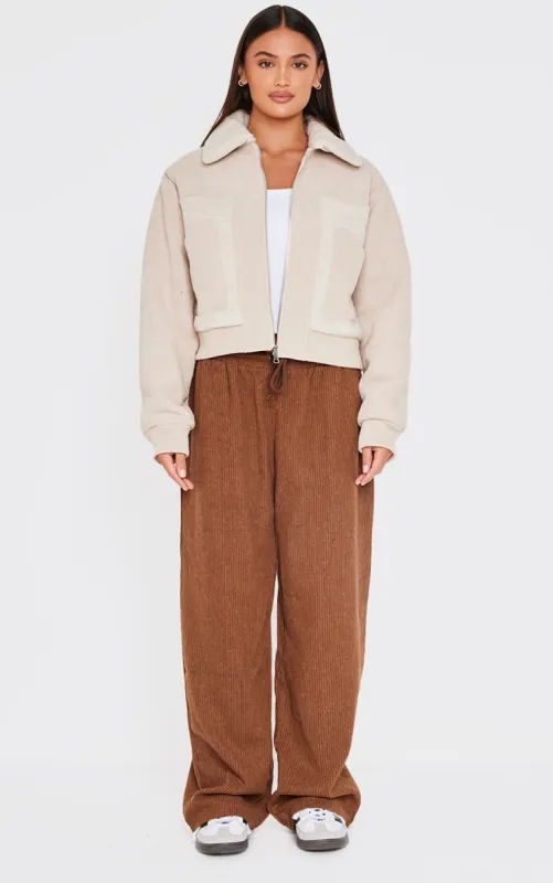 Brown Textured Low Rise Drawstring Straight Leg Trousers sold by Pretty Little Thing