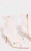 Cream Wide Fit Faux Leather Point Toe Buckle Detail Tab Ankle Heeled Boots sold by Pretty Little Thing