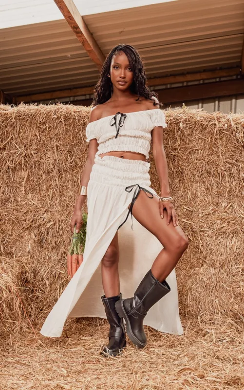 Cream Shirred Split Hem Maxi Skirt sold by Pretty Little Thing