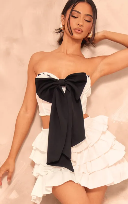 Petite White Bandeau Bow Corset Top sold by Pretty Little Thing