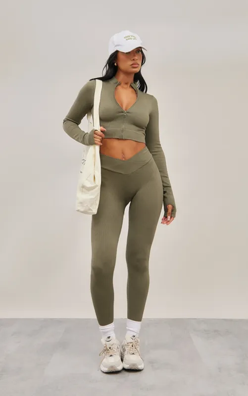 Olive Seamless Cross Front Seam Detail Leggings sold by Pretty Little Thing