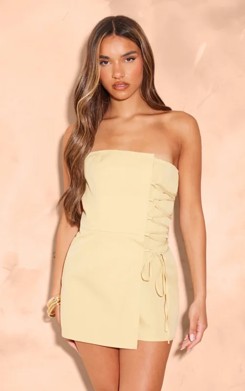 Mustard Structured Woven Bandeau Skort Playsuit sold by Pretty Little Thing