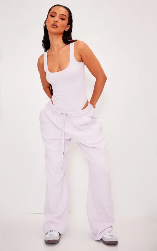 Petite Purple Washed Wide Leg Joggers sold by Pretty Little Thing