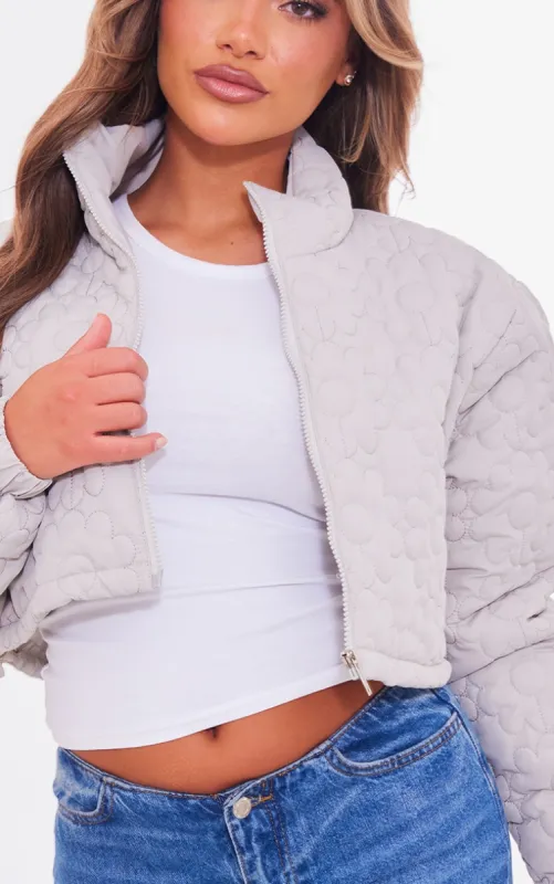 Grey Floral Embossed Cropped Padded Jacket sold by Pretty Little Thing