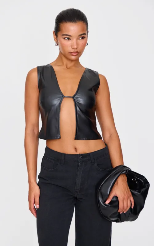 Black Faux Leather Cut Out Crop Top sold by Pretty Little Thing