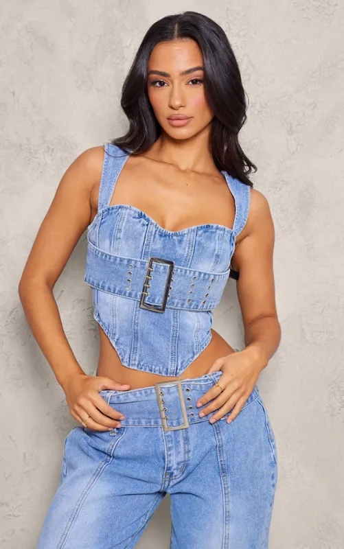Petite Light Blue Denim Buckle Detail Corset Top sold by Pretty Little Thing