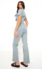 Light Blue Zip Up Racer Style Denim Jumpsuit sold by Pretty Little Thing