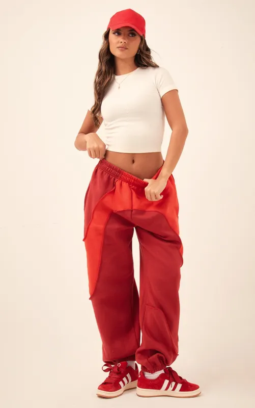 Red Colour Block Sweat Cuffed Oversized Joggers sold by Pretty Little Thing