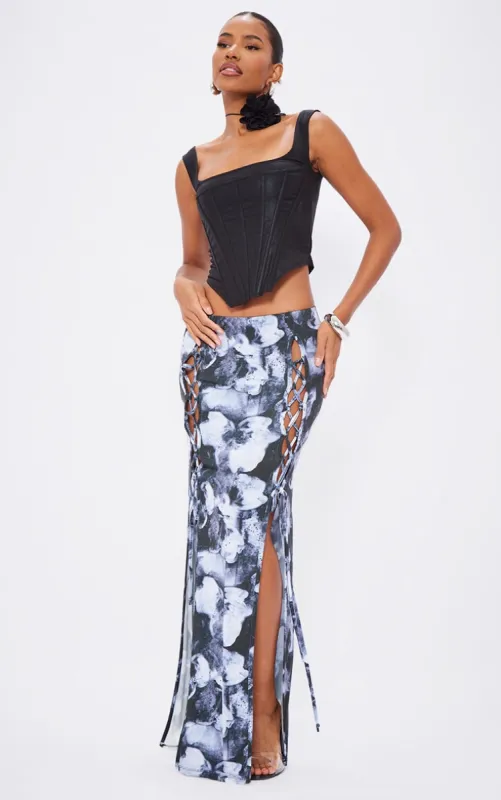 Black Printed Slinky Lace Up Front Maxi Skirt sold by Pretty Little Thing