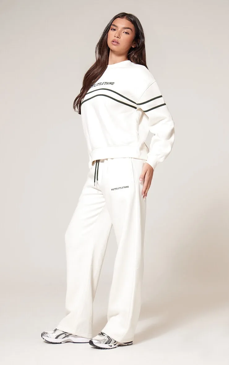 PRETTYLITTLETHING Cream Contrast Print Wide Leg Joggers sold by Pretty Little Thing