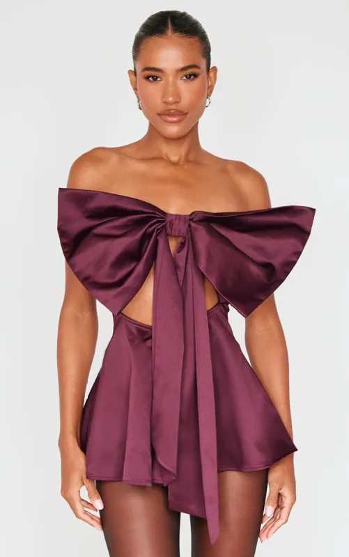 Burgundy Satin Oversized Bow Bandeau Playsuit sold by Pretty Little Thing