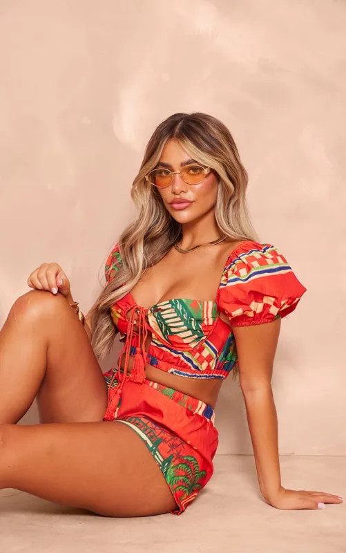 Red Abstract Print Woven Puff Sleeve Crop Top sold by Pretty Little Thing