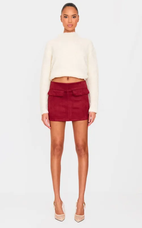 Burgundy Faux Suede Pocket Front Mini Skirt made by Pretty Little Thing