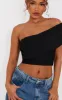 Petite Black Mesh One Shoulder Ruched Crop Top sold by Pretty Little Thing