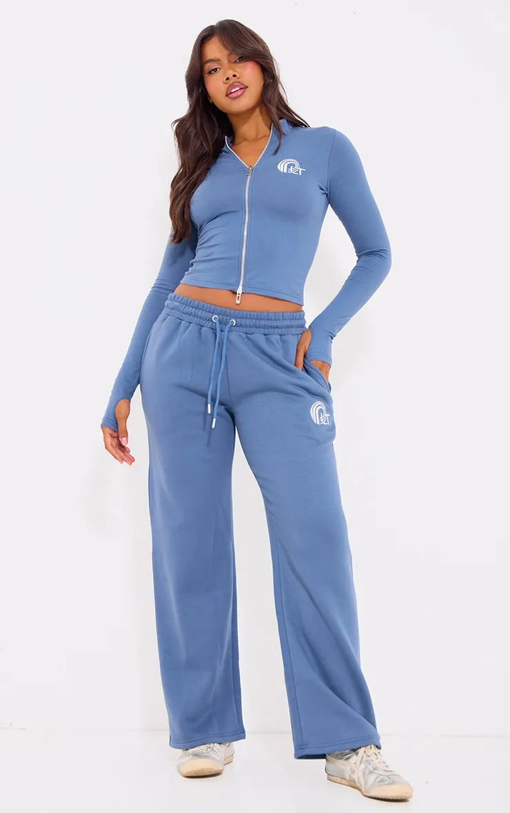 PRETTYLITTLETHING Blue Embroidered Graphic Wide Leg Joggers sold by Pretty Little Thing