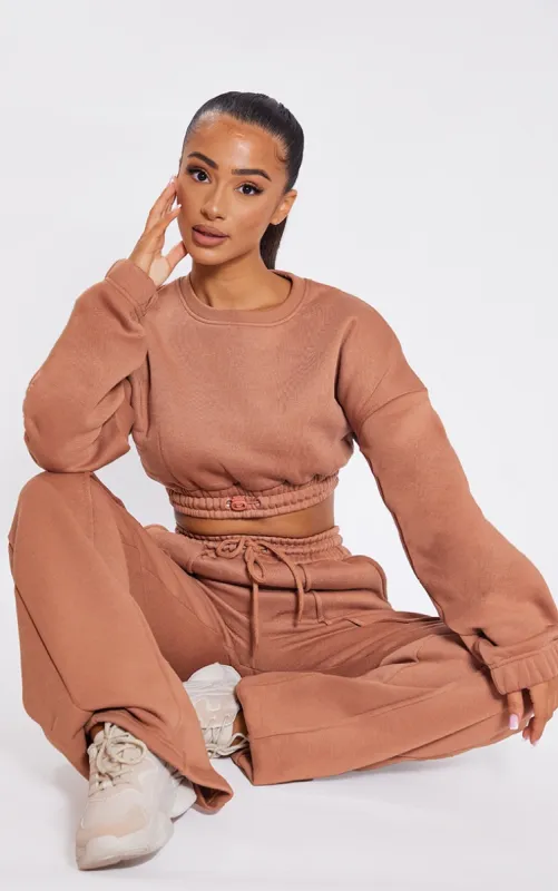 Petite Tan Crop Elasticated Hem Sweat Top made by Pretty Little Thing