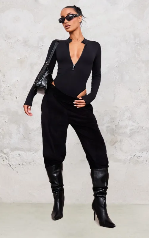 Black Contour Zip Up High Neck Bodysuit sold by Pretty Little Thing