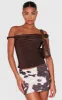 Brown Slinky Basic Cow Print Low Rise Extreme Micro Mini Skirt sold by Pretty Little Thing